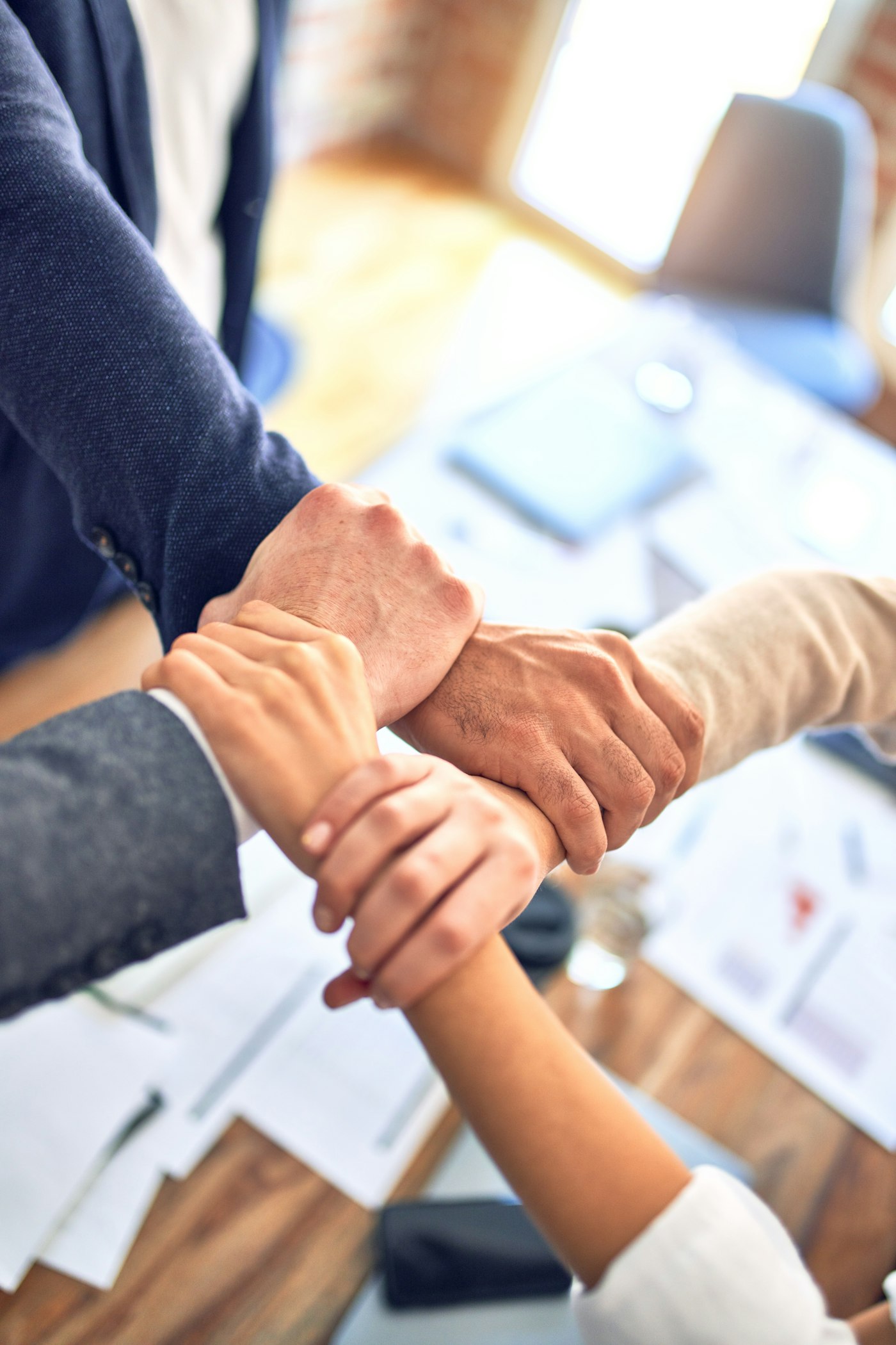 Partners joining hands in agreement